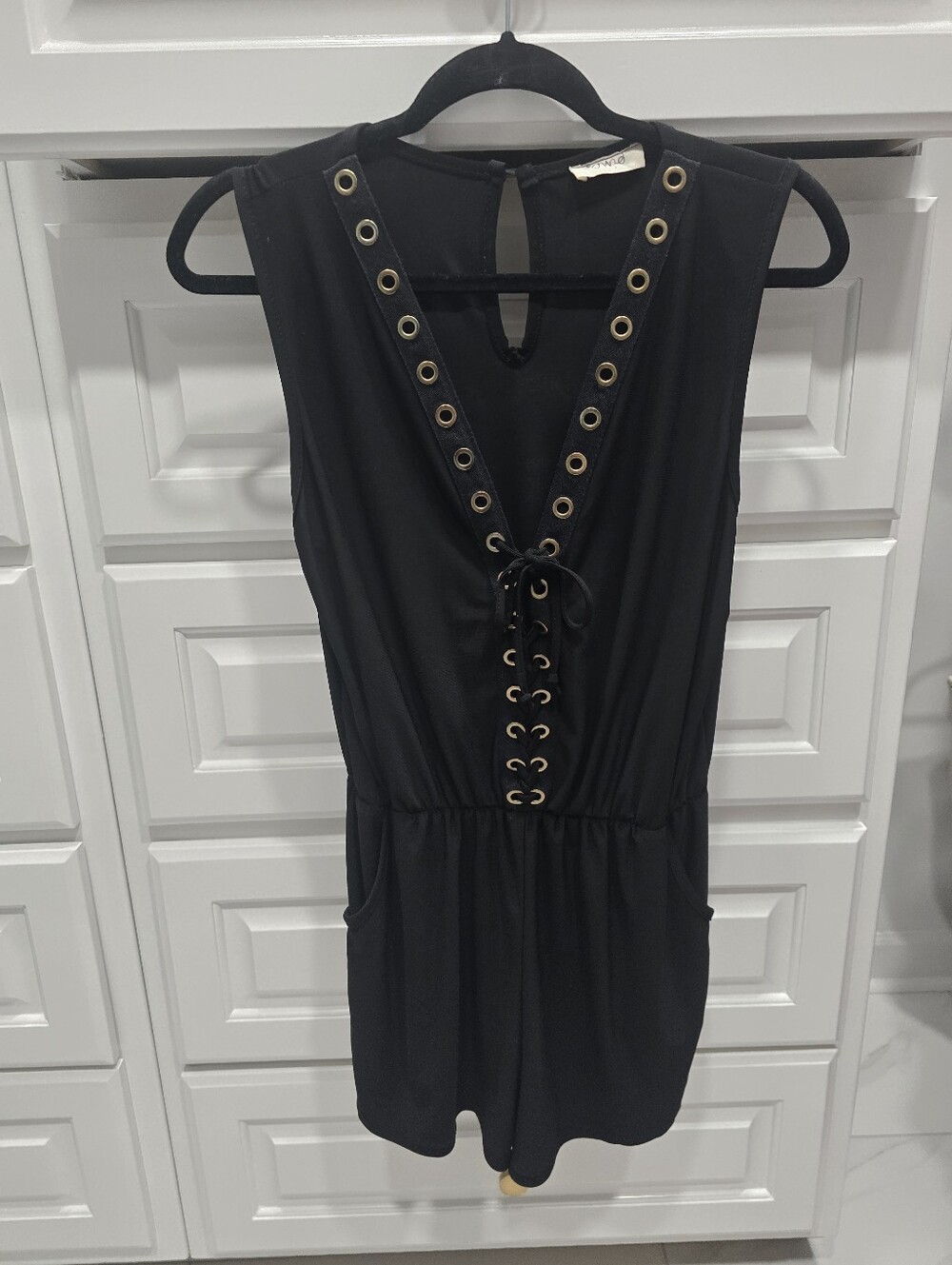 Black Lace Up Grommet Romper Sleeveless Pocketed Boutique Jumpsuit